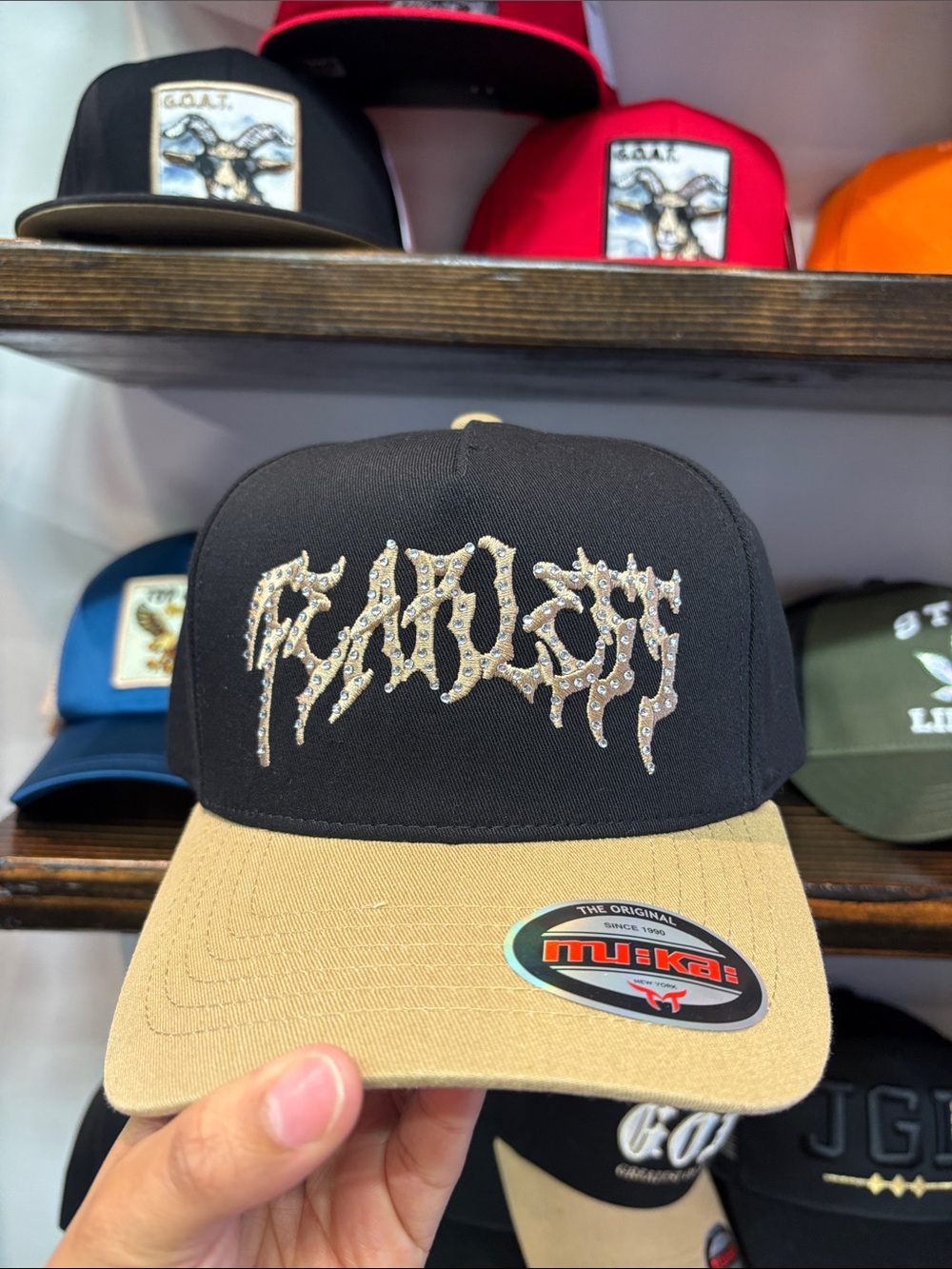 Black and Tan Flat-Brim Hat with Embellished 'GODS' Script